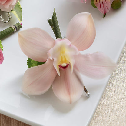Pink Cymbidium Boutonniere –  The Village Market Florist, Holly Springs MS