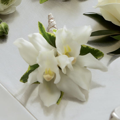 White Mini Cymbidium Boutonniere –  The Village Market Florist, Holly Springs MS
